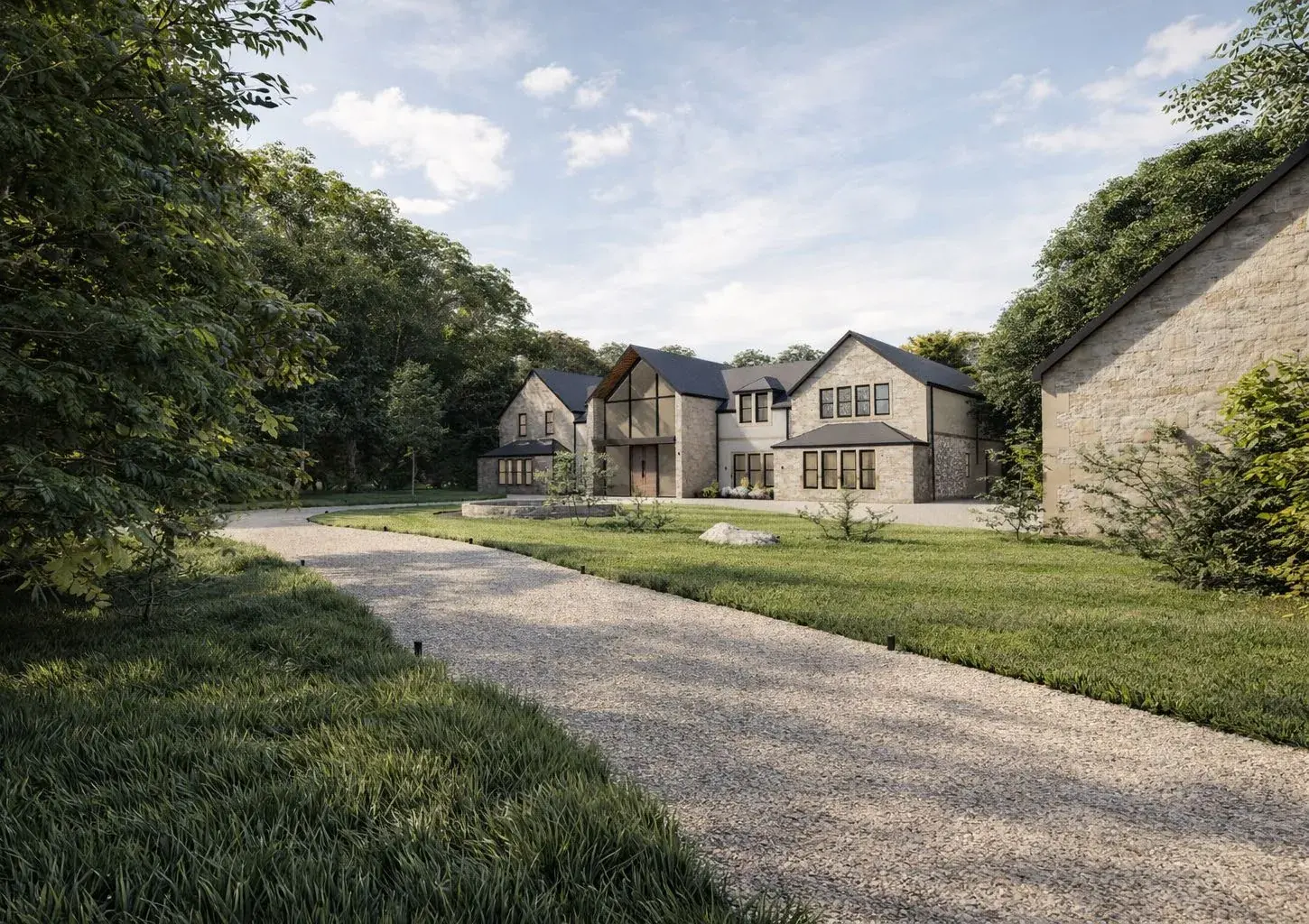 View along the gravel drive towards the residence, with the detached garage building to the right